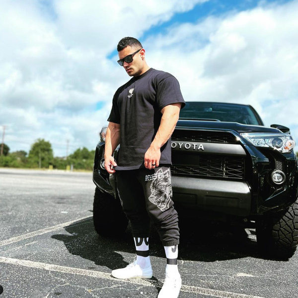 Ανδρικό αθλητικό παντελόνι με εφαρμογή και επιγραφή