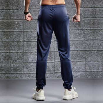 Спортен мъжки панталон с емблема и джоб 