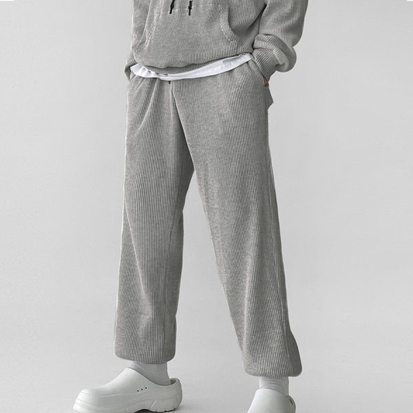 Φαρδύ αθλητικό παντελόνι με τσέπη για άνδρες