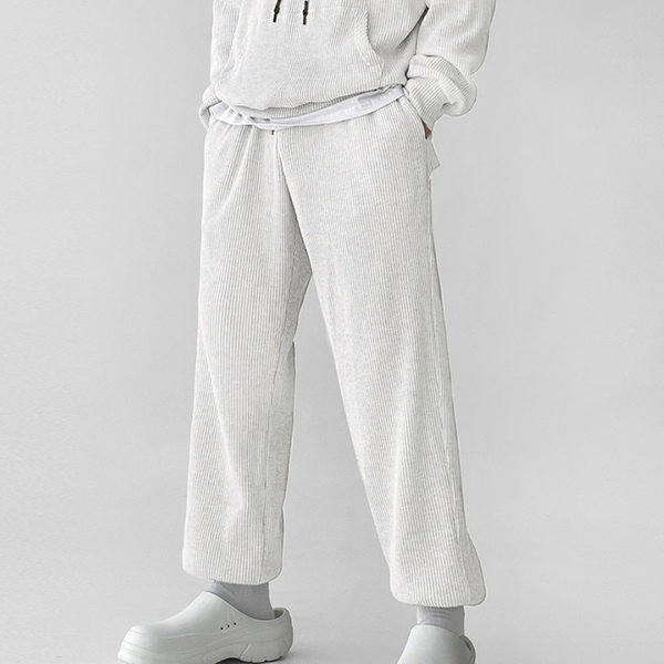 Φαρδύ αθλητικό παντελόνι με τσέπη για άνδρες