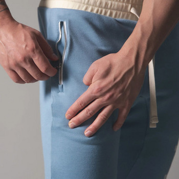 Мъжки спортни панталони с връзки и джоб с цип