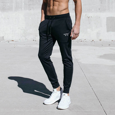 Sportiskas vīriešu bikses ar kabatu un uzrakstu