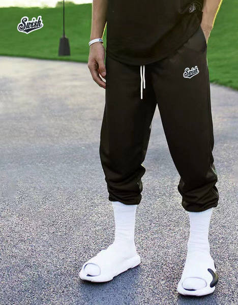 Ikdienas sporta bikses ar izšūtu logo un mežģīnēm vīriešiem