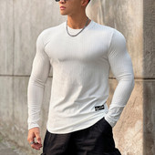 Egyszínű csíkos sportmodell blúz