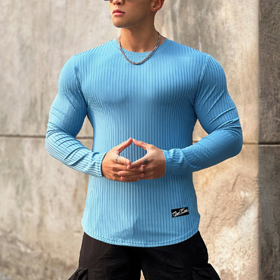 Egyszínű csíkos sportmodell blúz