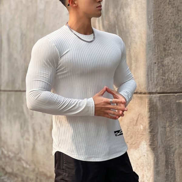 Egyszínű csíkos sportmodell blúz