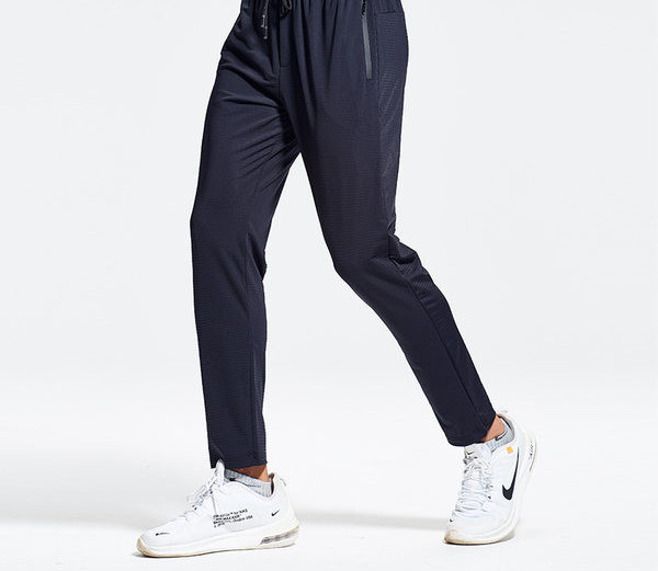 Vīriešu sporta bikses - ar kabatu un šņorēm