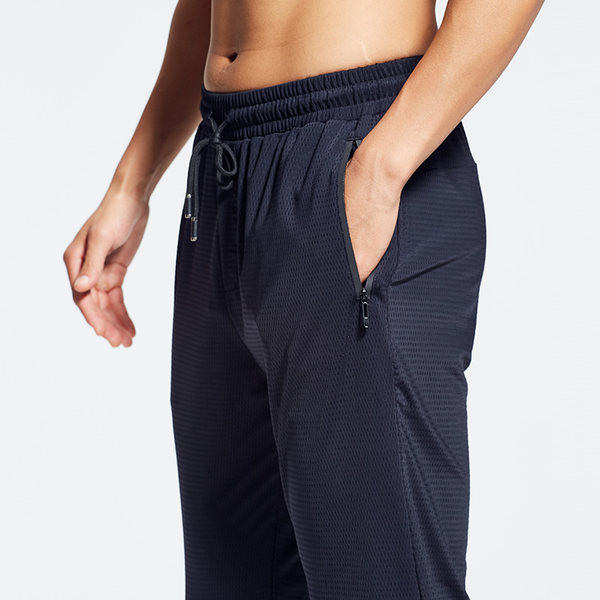 Vīriešu sporta bikses - ar kabatu un šņorēm