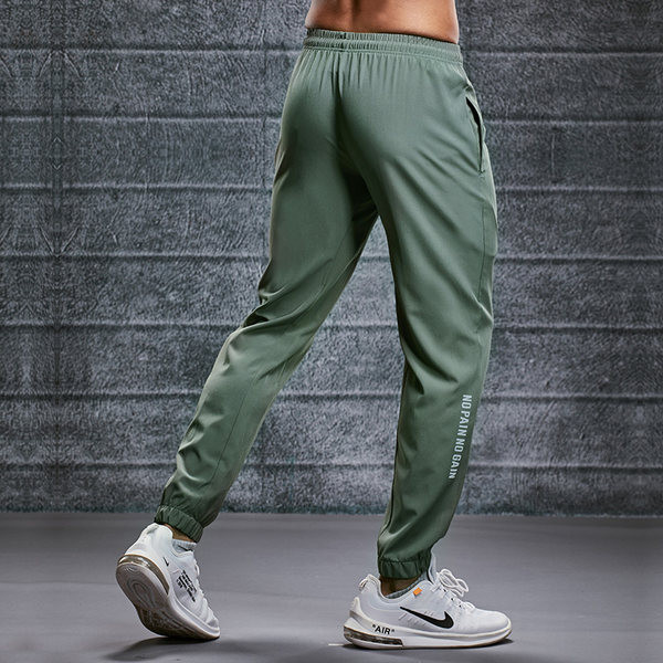 Tīra modeļa vīriešu bikses ar kabatu