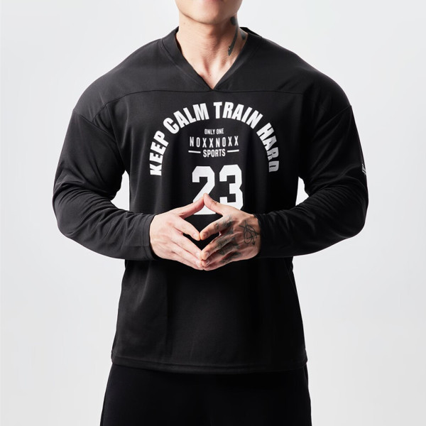 Vīriešu ikdienas blūze ar aplikāciju ar v veida izgriezumu