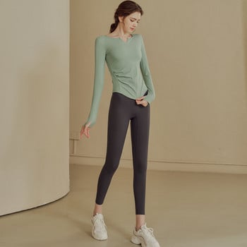 Γυναικεία αθλητική μπλούζα εφαρμοστό μοντέλο με μακριά μανίκια