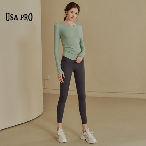 Ženska sportska bluza pripijenog modela s dugim rukavima