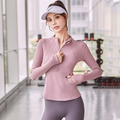 Sieviešu sporta blūze ar pusi rāvējslēdzēju un kabatu