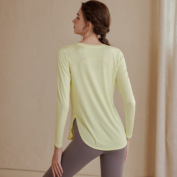 Sieviešu vienkrāsaina sporta blūze ar garām piedurknēm