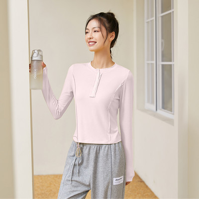 Női lezser, gombos sportblúz ovális nyakkivágással