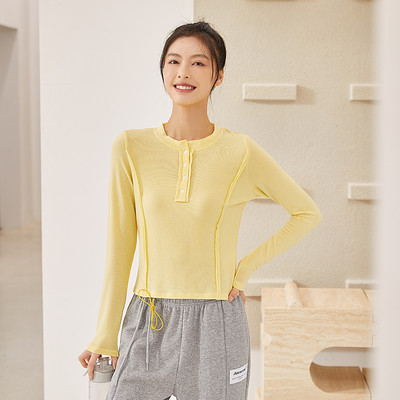 Női lezser, gombos sportblúz ovális nyakkivágással