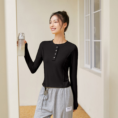 Női lezser, gombos sportblúz ovális nyakkivágással