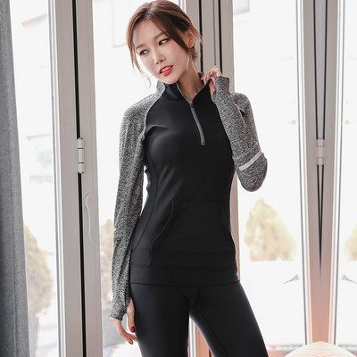 Sieviešu sporta blūze ar garām piedurknēm rāvējslēdzēju un kabatu