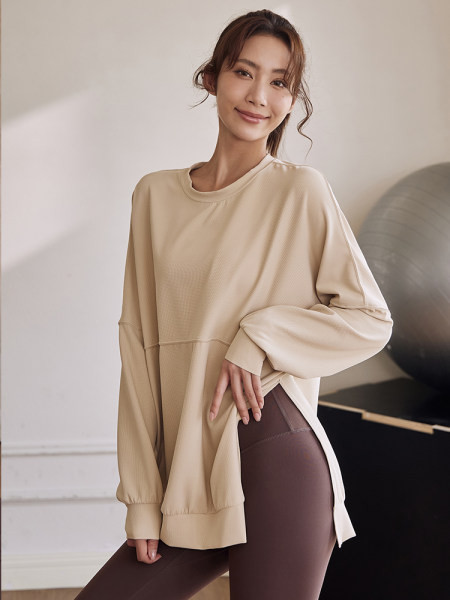 Široki model ženske sportske bluze