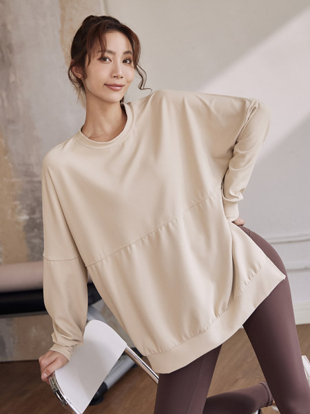 Široki model ženske sportske bluze