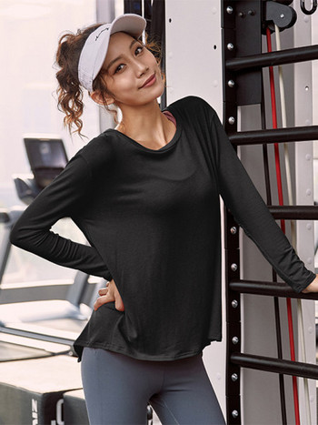 Дамски спортна блуза с ефектен гръб широк модел