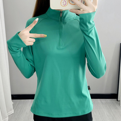 New model women`s blouse with a high collar suitable for sports