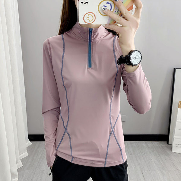 Női sportblúz magas gallérral és cipzárral