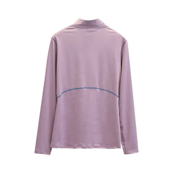 Női sportblúz magas gallérral és cipzárral