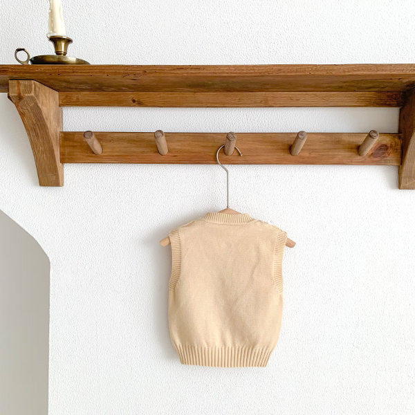 Bērnu ziemas veste ar smailu kakla izgriezumu