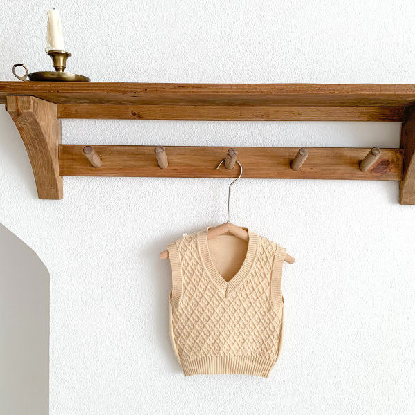 Bērnu ziemas veste ar smailu kakla izgriezumu