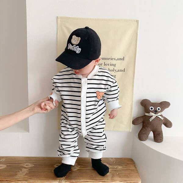 Mazuļa kombinezons ar apdruku un pogām