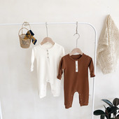 Mazuļa kombinezons ar pogām