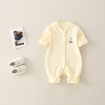 Mazuļa ziemas kombinezons ar pogām un apdruku