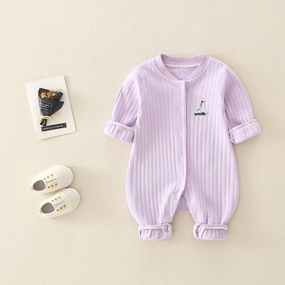 Mazuļa ziemas kombinezons ar pogām un apdruku