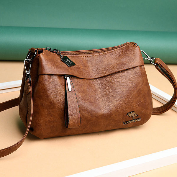 Ženska kožna torba s velikom ručkom u različitim bojama