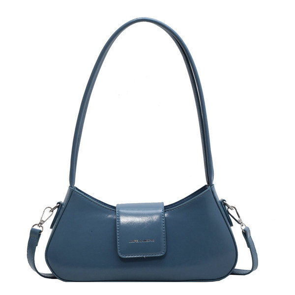 Ādas rokassomiņa ar iegravētu uzrakstu