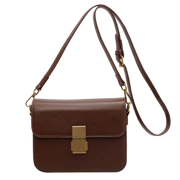 Sieviešu ādas kvadrātveida soma ar metāla aizdari