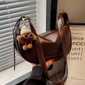 Jauna modeļa eko ādas rokassomiņa ar atslēgu piekariņu