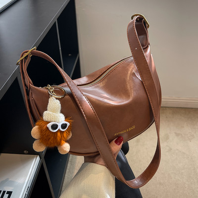 Jauna modeļa eko ādas rokassomiņa ar atslēgu piekariņu