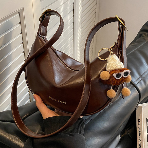 Jauna modeļa eko ādas rokassomiņa ar atslēgu piekariņu