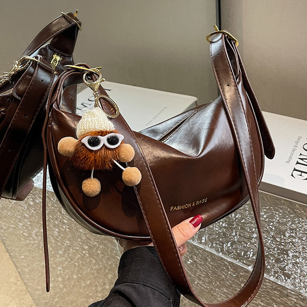 Jauna modeļa eko ādas rokassomiņa ar atslēgu piekariņu