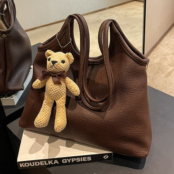 Moderna eko ādas rokassomiņa ar 3D elementu