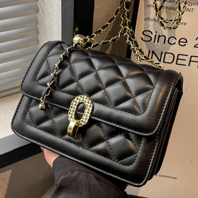 Ručna torbica s patentnim zatvaračem i zatvaračem