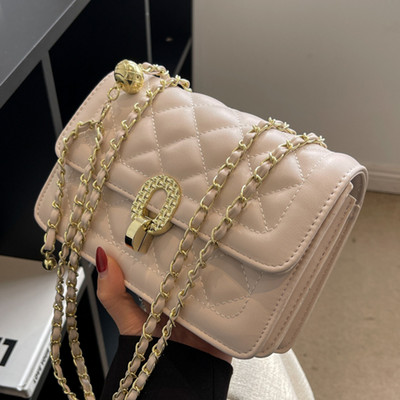 Ručna torbica s patentnim zatvaračem i zatvaračem