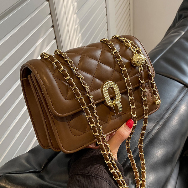 Ručna torbica s patentnim zatvaračem i zatvaračem