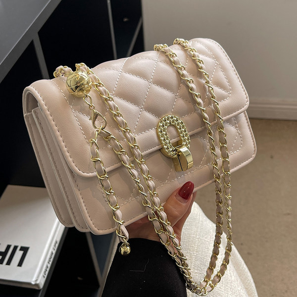 Ručna torbica s patentnim zatvaračem i zatvaračem