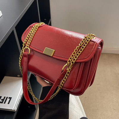 Rokassomiņa ar ķēdīti un metāla aizdari