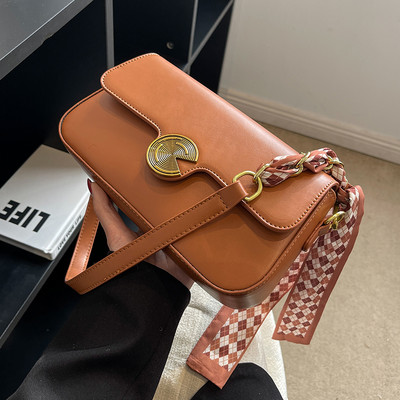 Rokassomiņa ar šalli