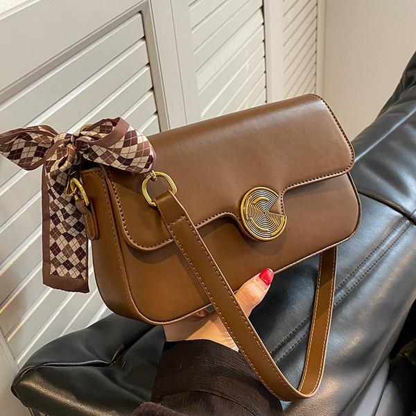 Rokassomiņa ar šalli