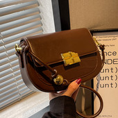 Maza soma ar magnētisku sprādzi un plecu rokturi